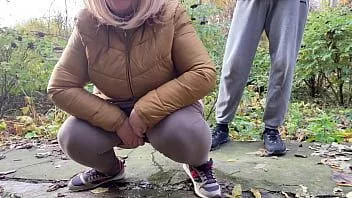 play Depraved curvy milf in leggings squats down and pisses next to me