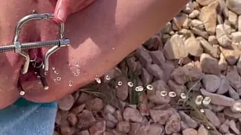 play Guy pee inside my pussy with speculum on the beach